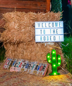 Rodeo themed mobile bar setup with western décor and event styling in Houston
