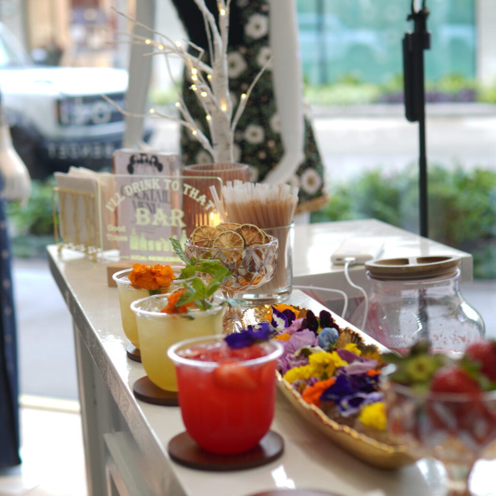 Multiple prepared drinks at a Houston community event mobile bar