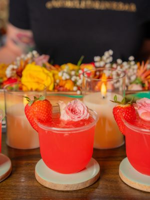 Fresa Darling mocktail served over ice with fresh strawberry purée, and lime juice, created by a mobile bar service for non-alcoholic cocktail lovers.