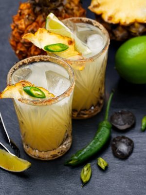 Spicy Pine cocktail with Blanco Tequila, fresh pineapple juice, lime, agave, and optional muddled jalapeño – tequila pineapple cocktail by I’ll Drink To That! mobile bar